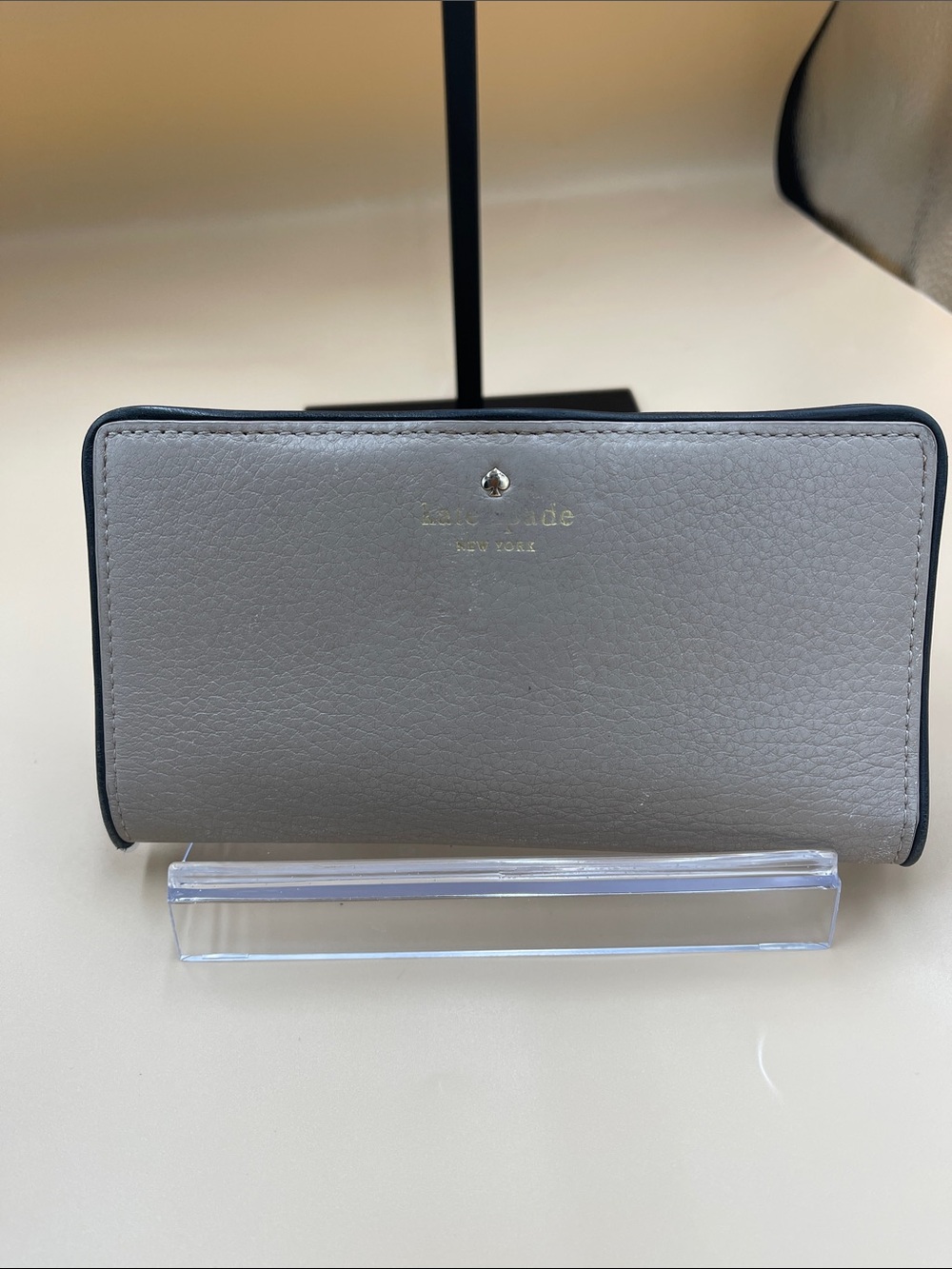 kate spade Taupe Gray Pebbled Leather with snap closure